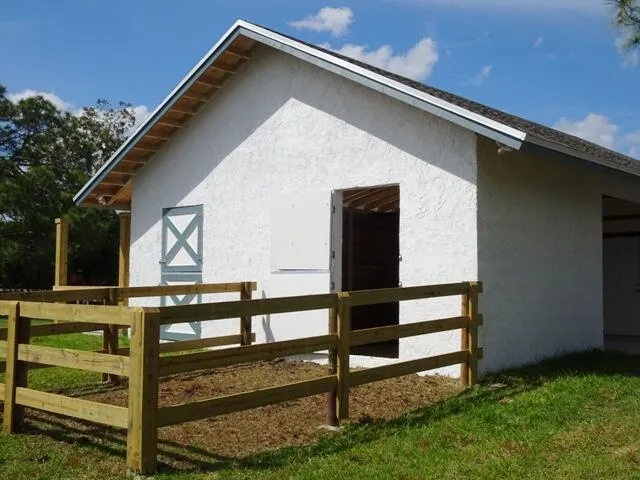 a view of a golf course with a lake