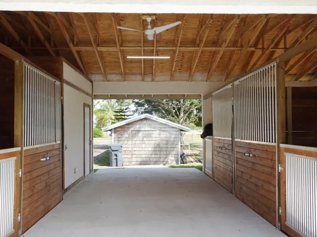 a pink tub sitting next to a window