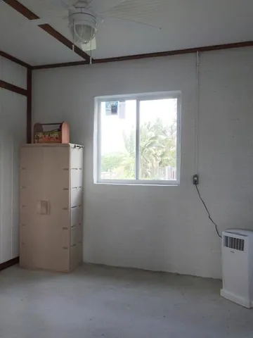 a view of a garden with an empty space