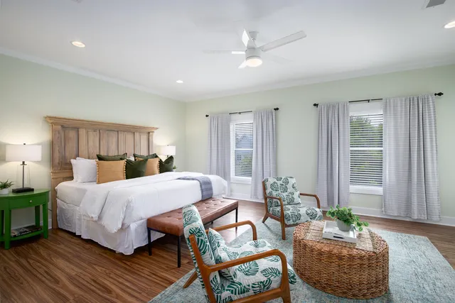 a bedroom with a bed and a couch