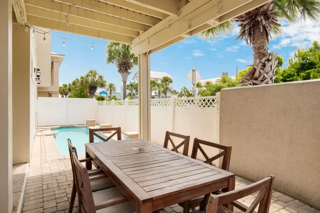 an outdoor space with patio furniture