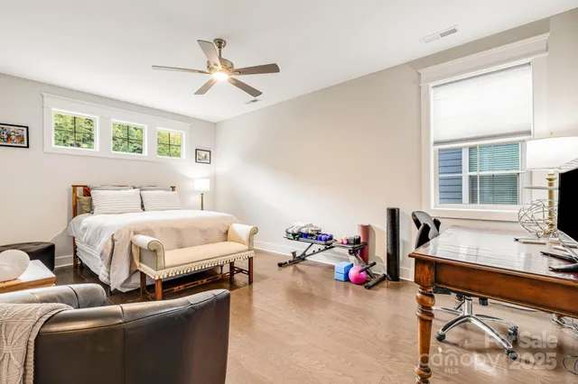 a bed room with a bed and a window