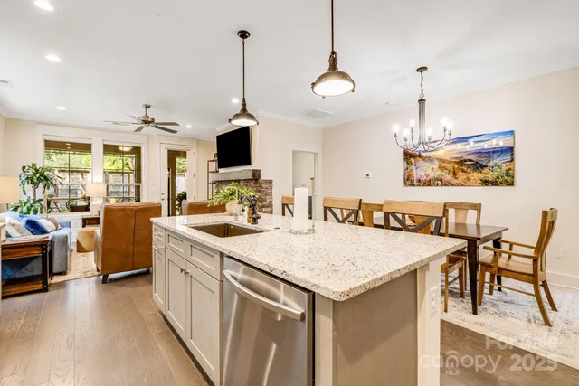 a kitchen that has a lot of cabinets in it