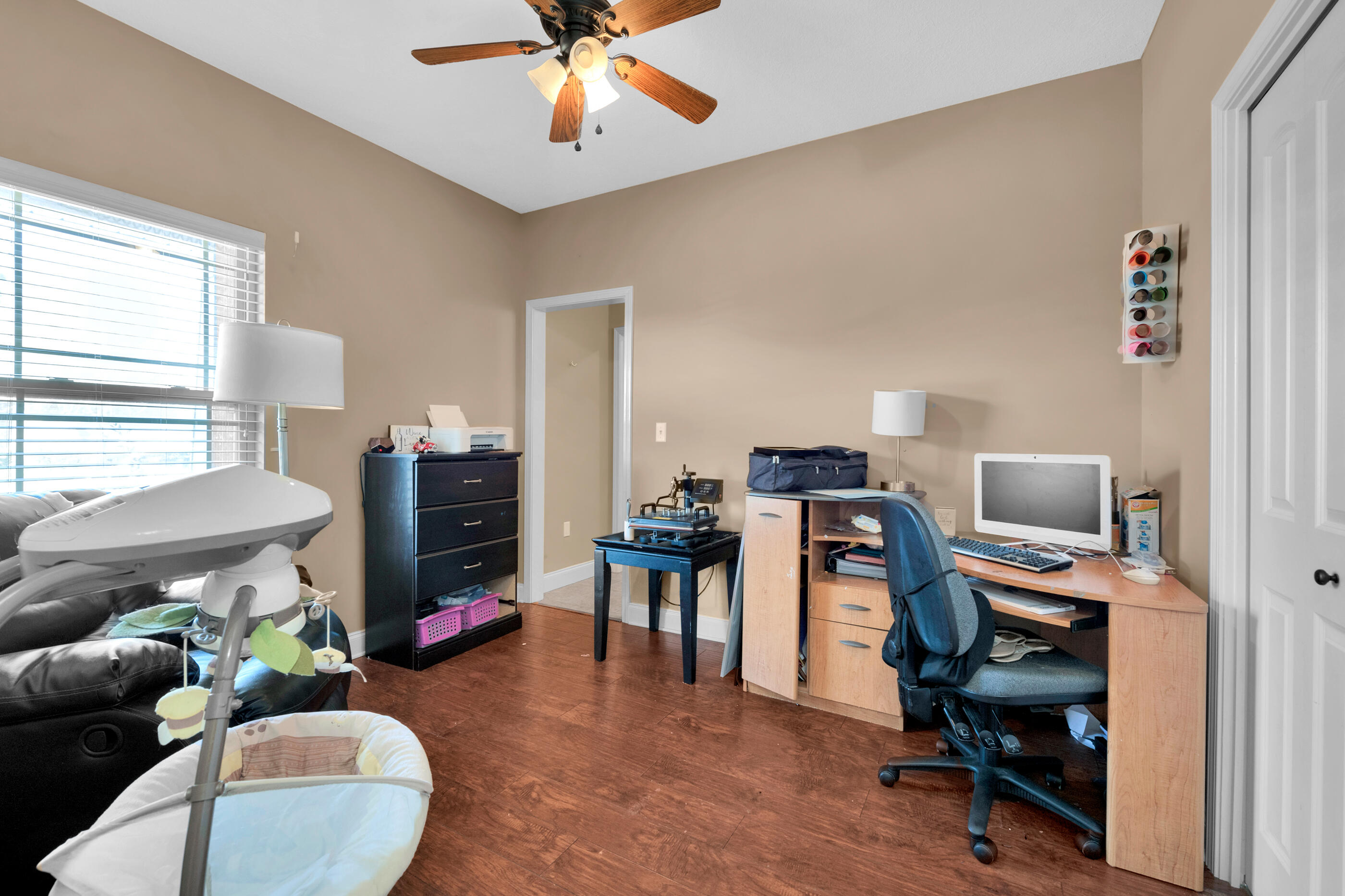 4632 Hermosa Road Crestview, FL 32539 - Photo 11 of 22 a work room with furniture and a window