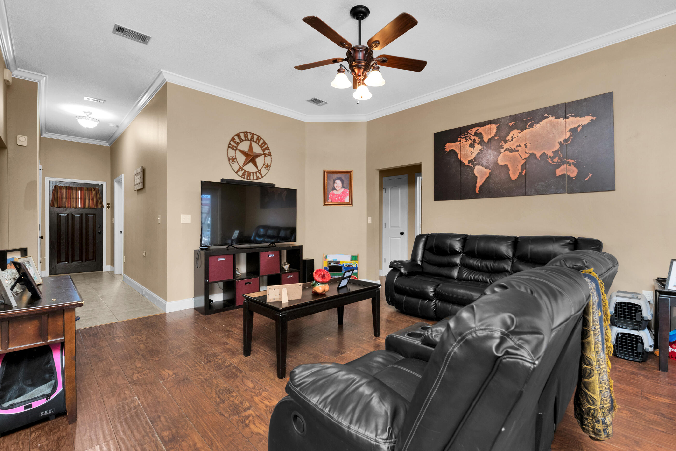 4632 Hermosa Road Crestview, FL 32539 - Photo 2 of 22 a living room with furniture and a flat screen tv