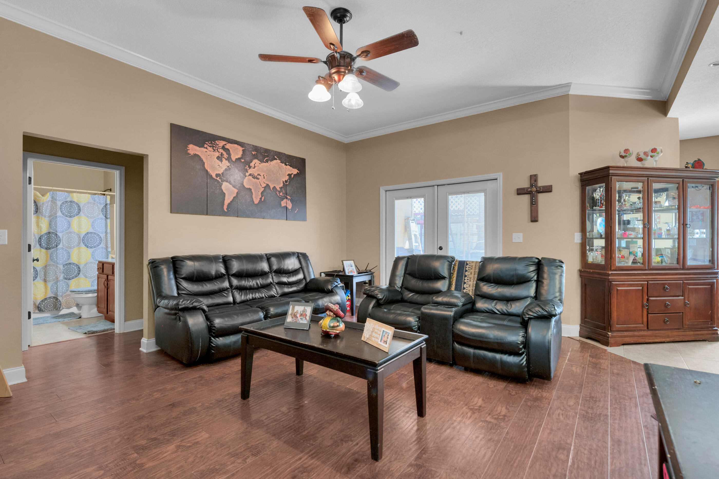 4632 Hermosa Road Crestview, FL 32539 - Photo 5 of 22 a living room with furniture and wooden floor