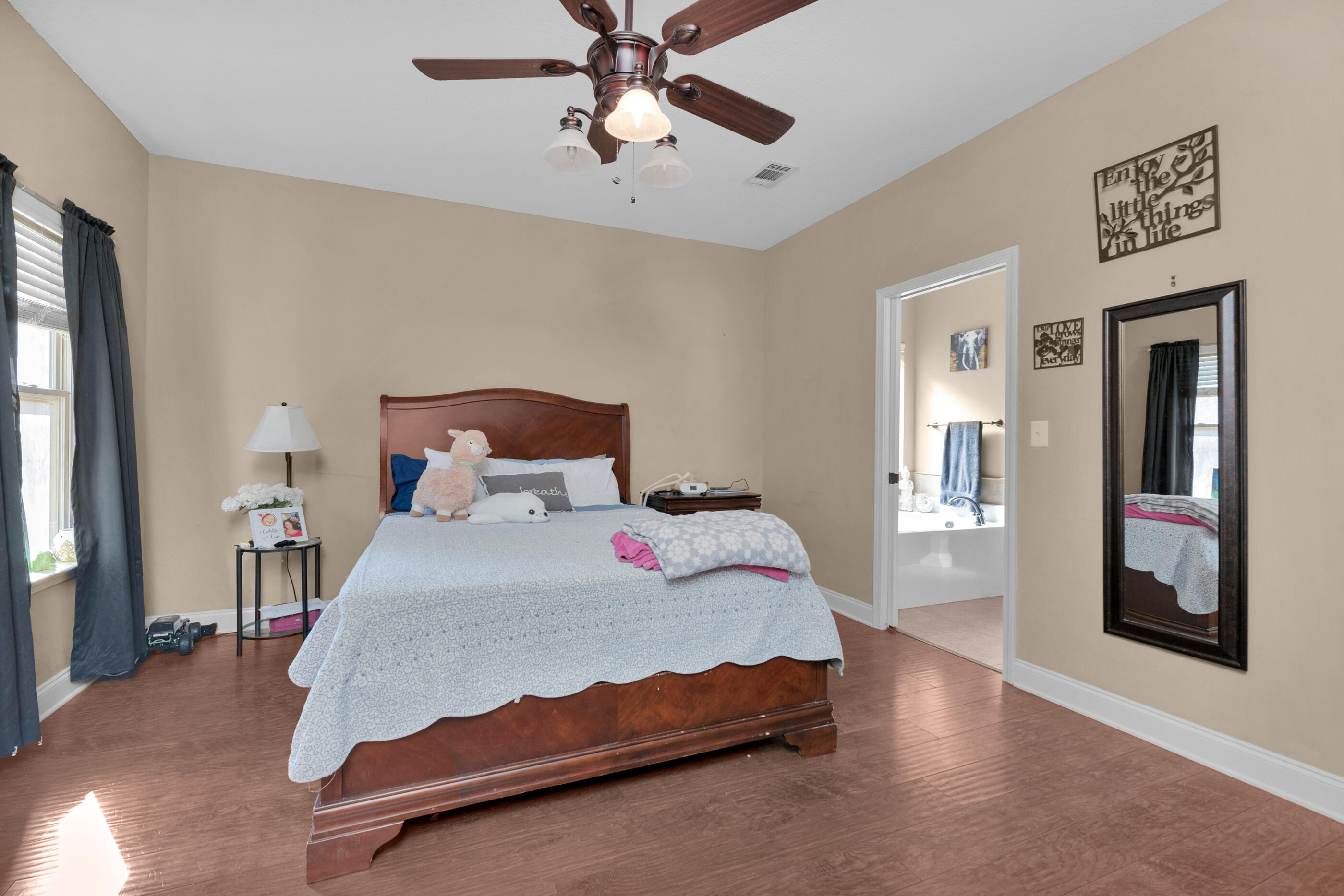 4632 Hermosa Road Crestview, FL 32539 - Photo 8 of 22 a bedroom with a bed and window