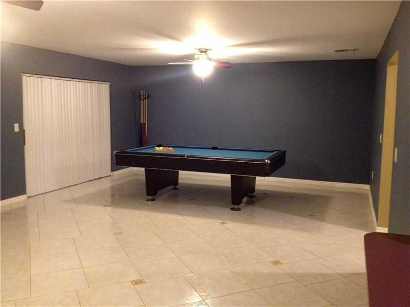 5498 Gate Lake Road, Unit 5498 Tamarac, FL 33319 - Photo 8 of 25 Living Room.
