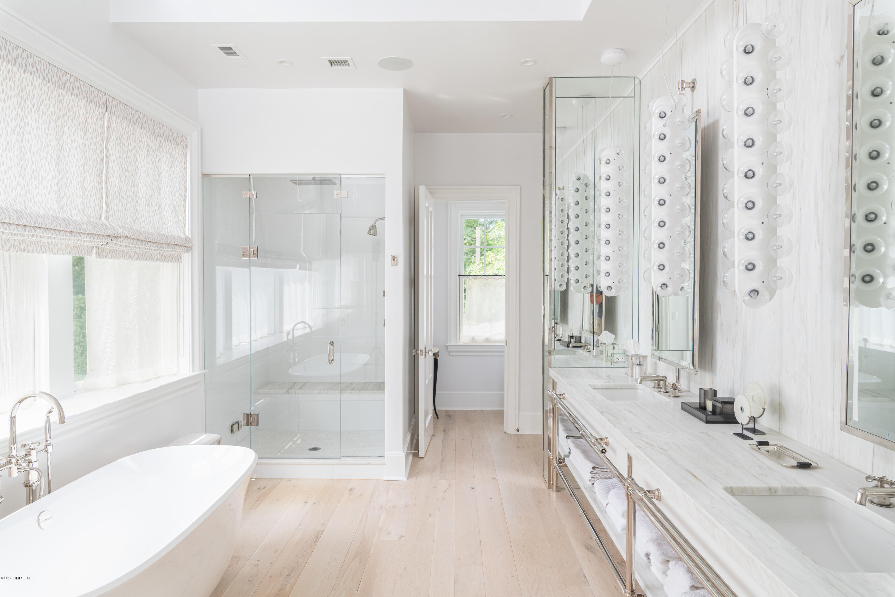 Undisclosed Address Greenwich, CT 06830 - Photo 16 of 30 a spacious bathroom with a double vanity sink mirror double and shower