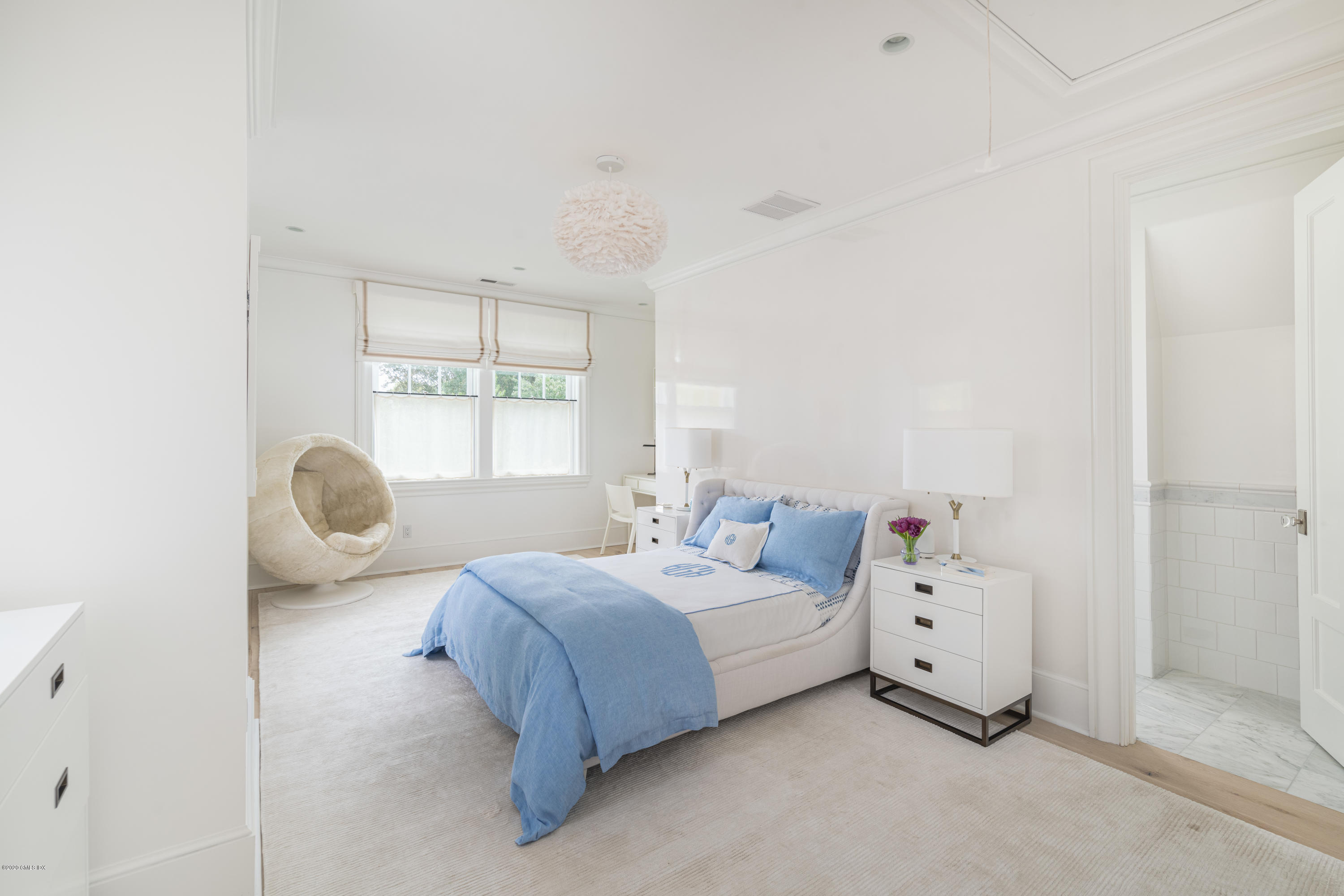 Undisclosed Address Greenwich, CT 06830 - Photo 17 of 30 a bedroom with a bed and window