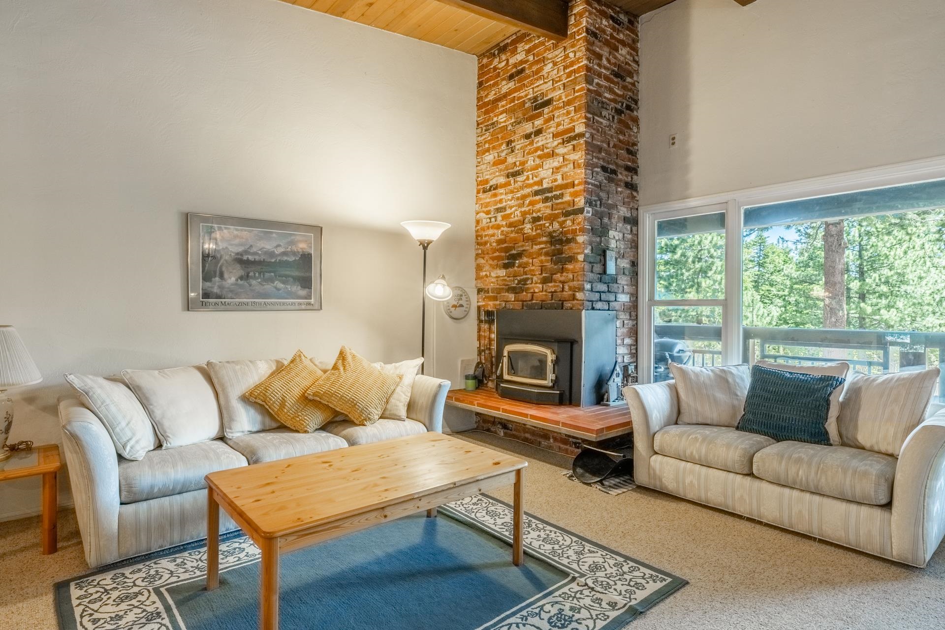 50 Hidden Valley Road, Unit 17 Mammoth Lakes, CA 93546 - Photo 4 of 40 Living area with a vaulted wood-paneled ceiling and exposed beams