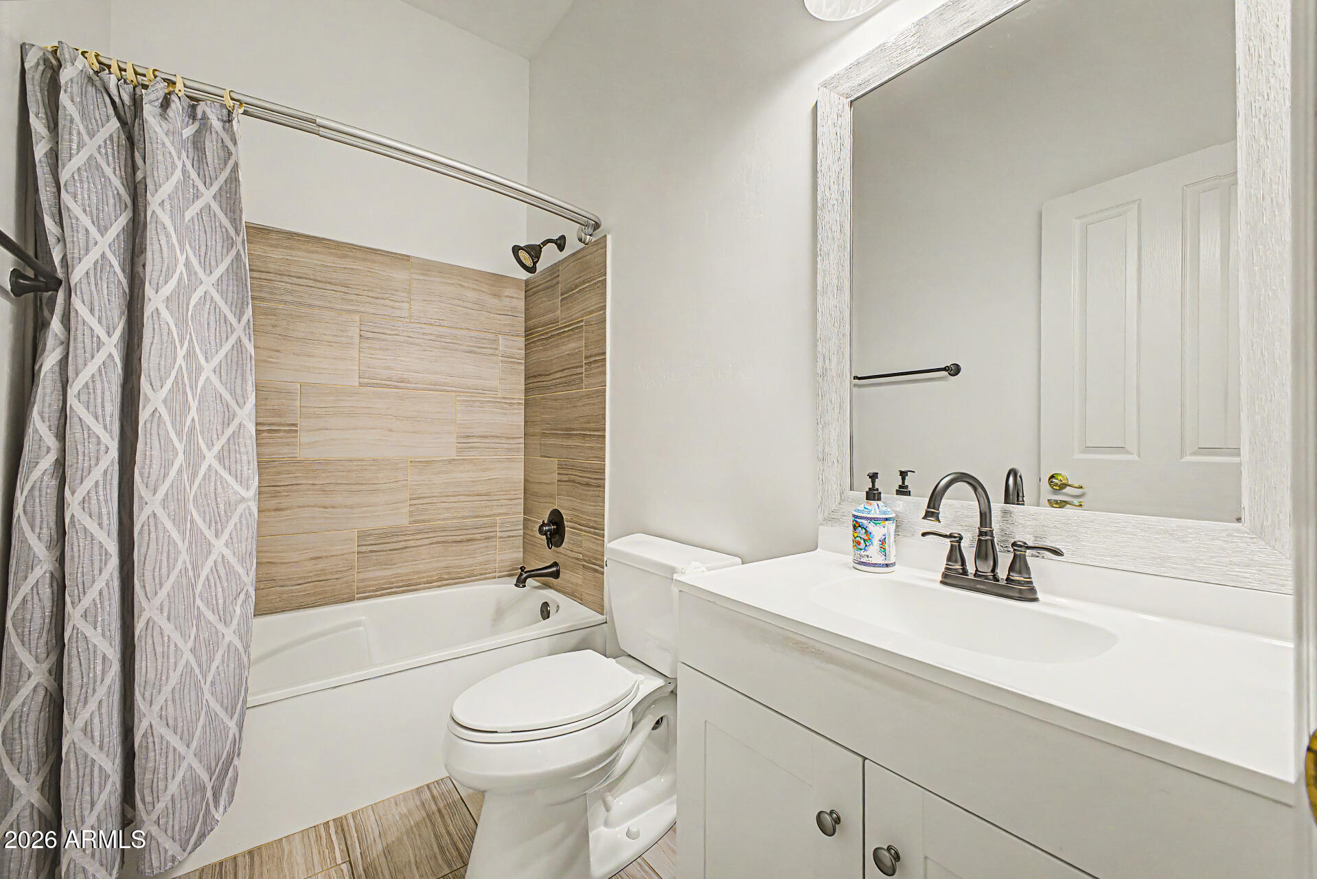808 West Citrus Way Phoenix, AZ 85013 - Photo 24 of 35 a bathroom with a sink a toilet and shower