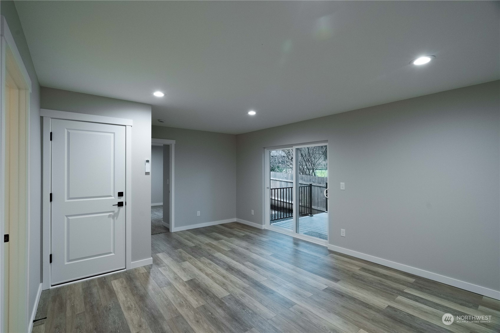 1654 Baby Doll Road Southeast Port Orchard, WA 98366 - Photo 16 of 30 a view of empty room with wooden floor