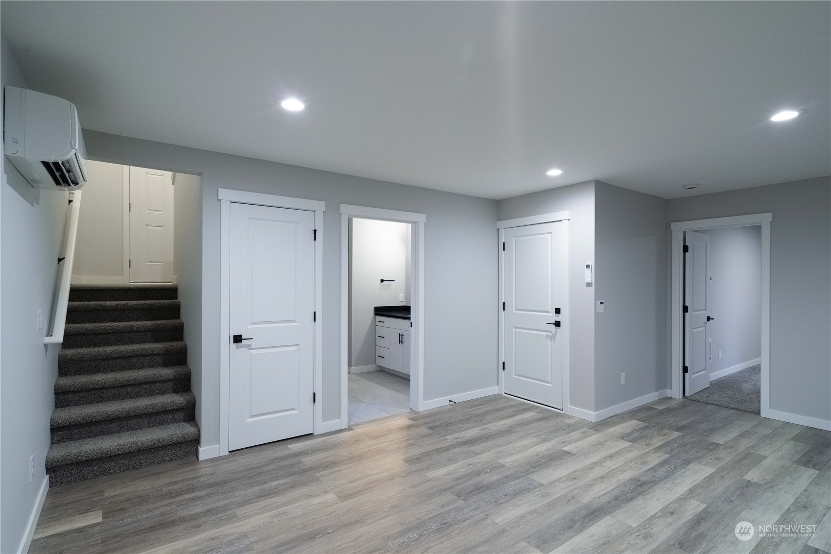 1654 Baby Doll Road Southeast Port Orchard, WA 98366 - Photo 17 of 30 wooden floor in an empty room with wooden floor