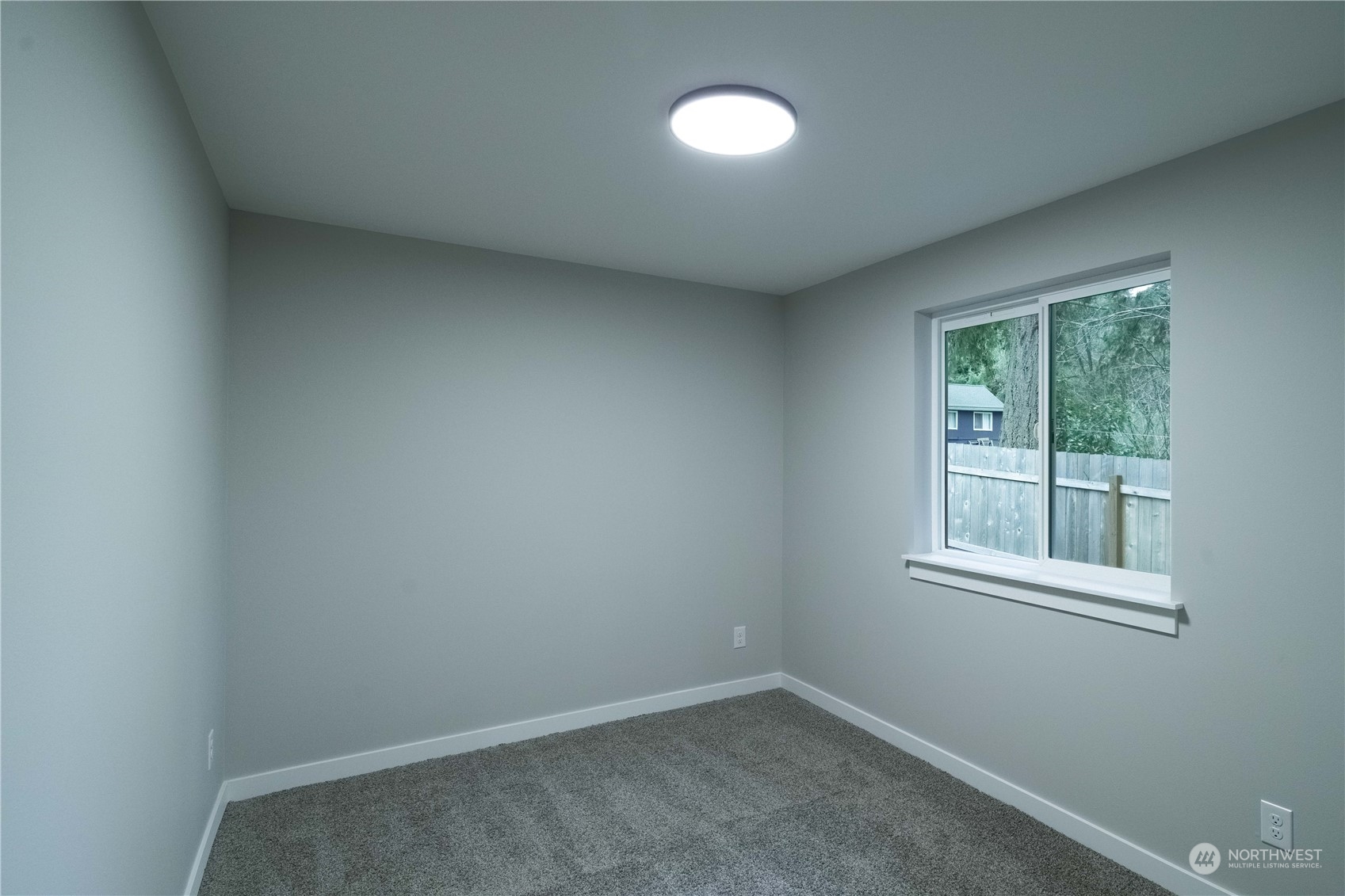 1654 Baby Doll Road Southeast Port Orchard, WA 98366 - Photo 19 of 30 an empty room with a window