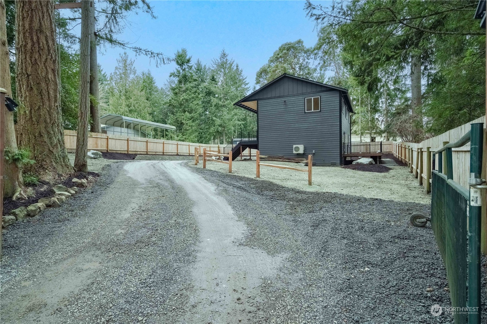 1654 Baby Doll Road Southeast Port Orchard, WA 98366 - Photo 25 of 30 a view of a backyard with a garden and entertaining space