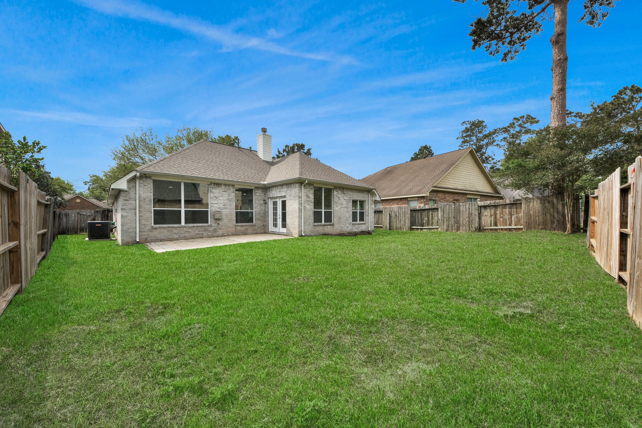 14423 Gadwall Court Houston, TX 77044 - Photo 41 of 42 a front view of a house with a garden
