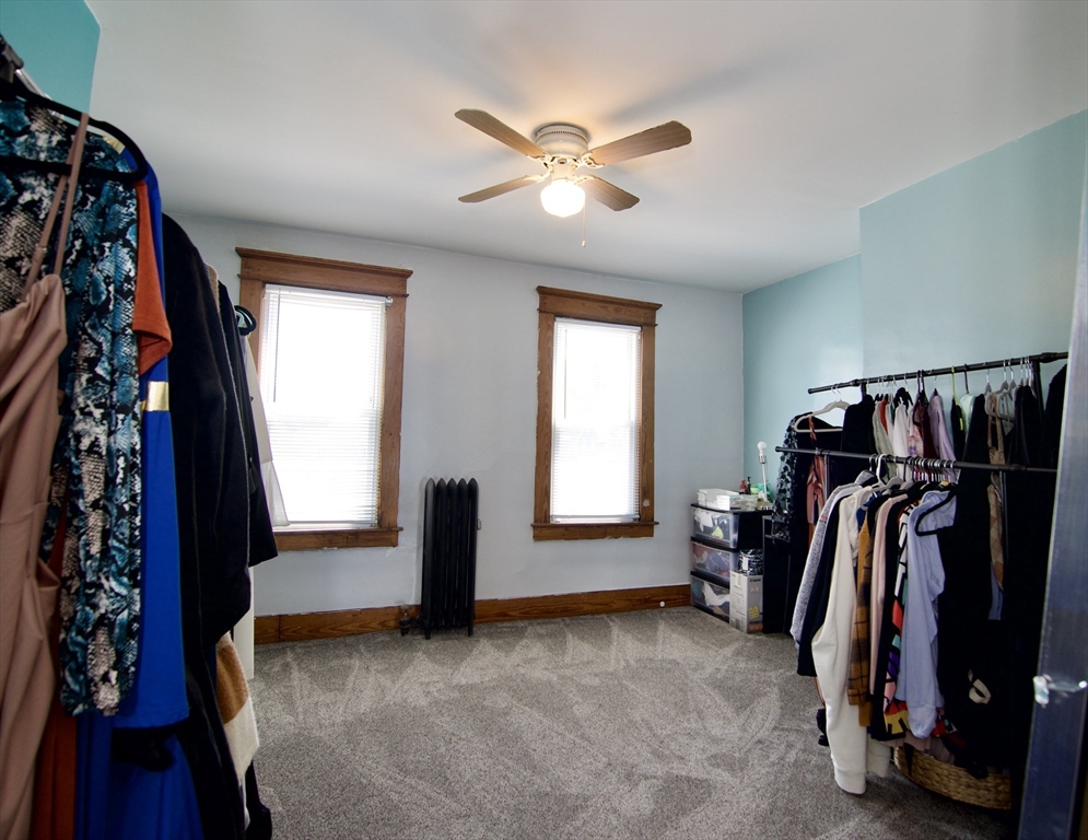 16 Amity Court Springfield, MA 01108 - Photo 39 of 42 a view of walk in closet with clothes and shoes