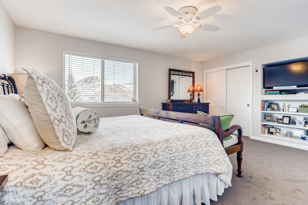 98 Lookout Ridge Drive, Unit 98 Dillon, CO 80435 - Photo 16 of 29 Lay back and enjoy the MASTER BEDROOM with Mountain views or your favorite TV Show...