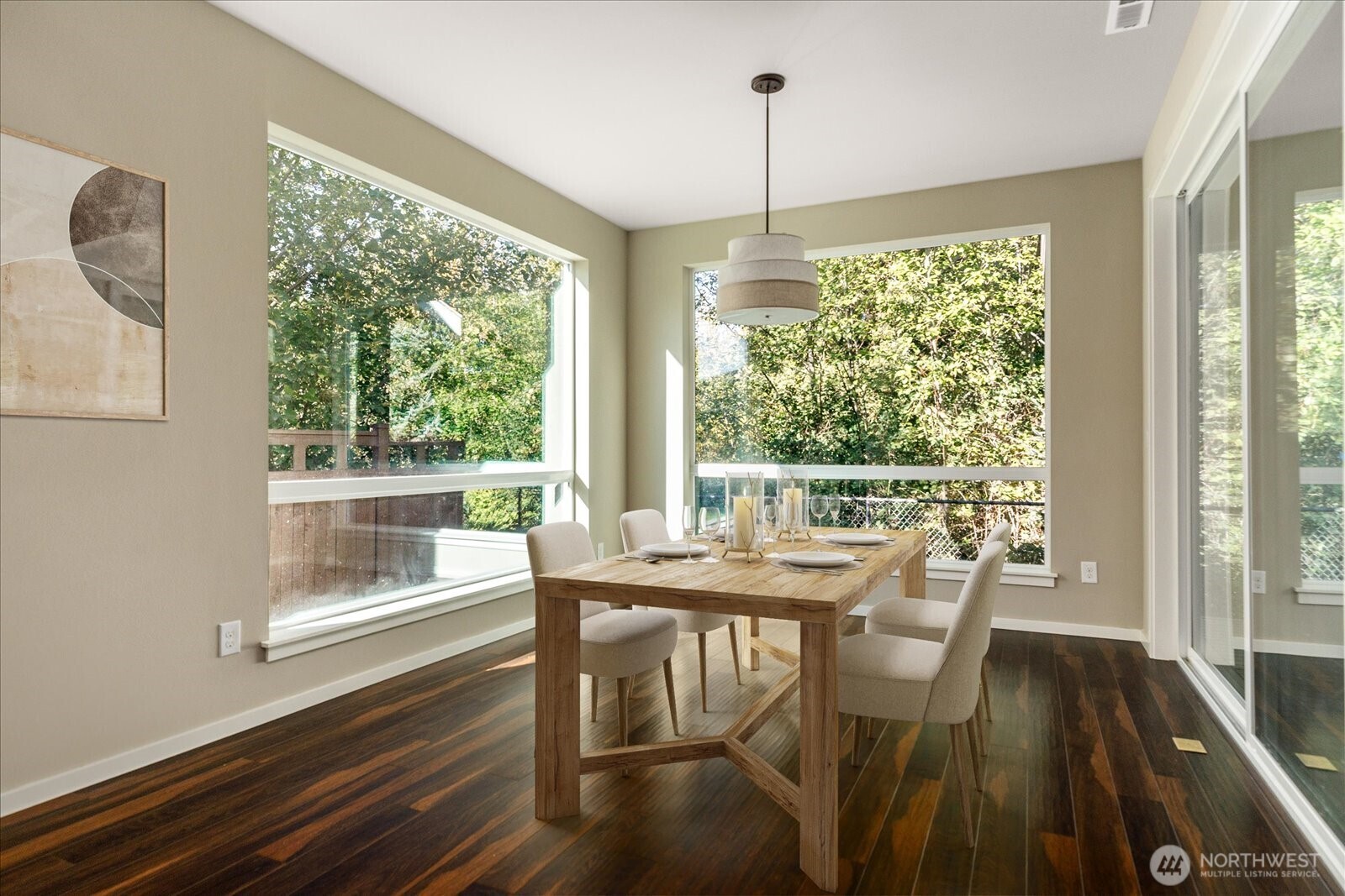 3701 170th Place Southeast Bothell, WA 98012 - Photo 16 of 37 a view of a dining room with furniture window and wooden floor