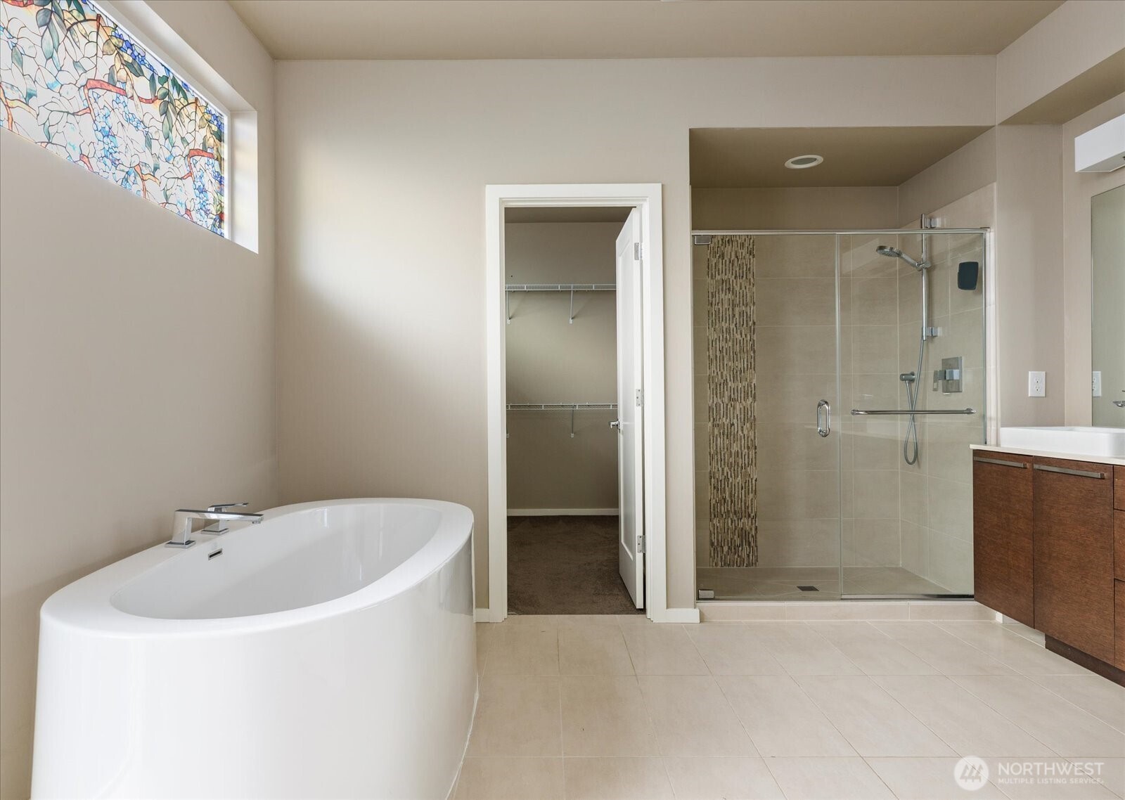 3701 170th Place Southeast Bothell, WA 98012 - Photo 21 of 37 a bathroom with a bathtub and shower