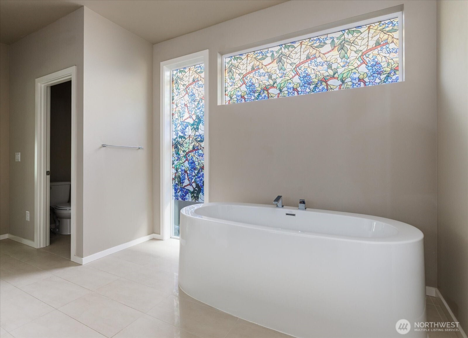 3701 170th Place Southeast Bothell, WA 98012 - Photo 22 of 37 a bathroom with a bathtub
