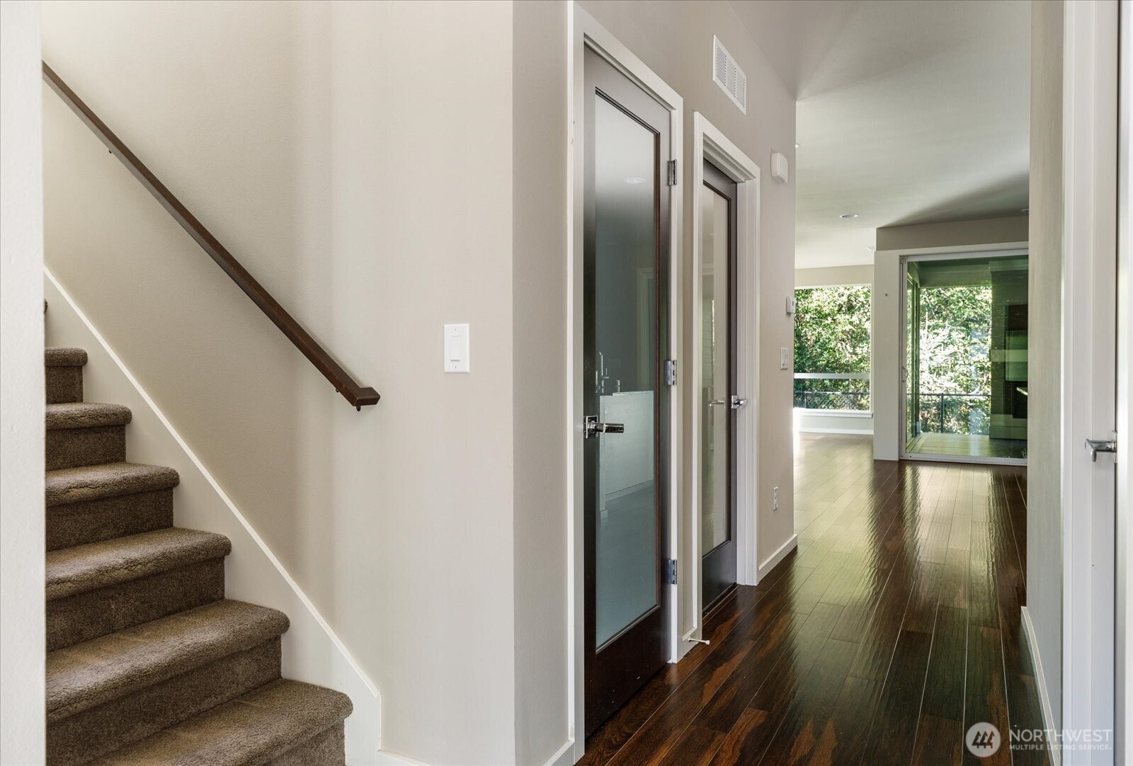 3701 170th Place Southeast Bothell, WA 98012 - Photo 23 of 37 a view of entryway and hall with wooden floor