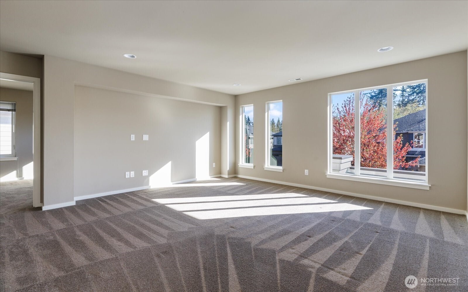 3701 170th Place Southeast Bothell, WA 98012 - Photo 25 of 37 a view of an empty room with window and wooden floor
