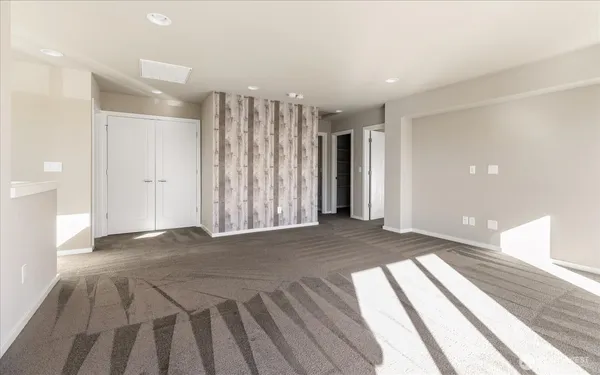 a view of a room with a en suite bathroom