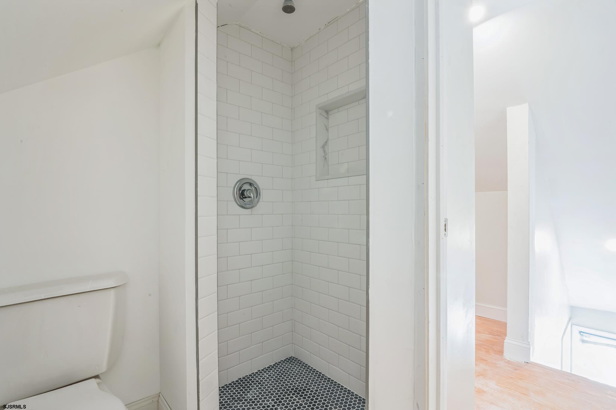 29 East Pierson Avenue Somers Point, NJ 08244 - Photo 11 of 15 a en suite bathroom with a shower