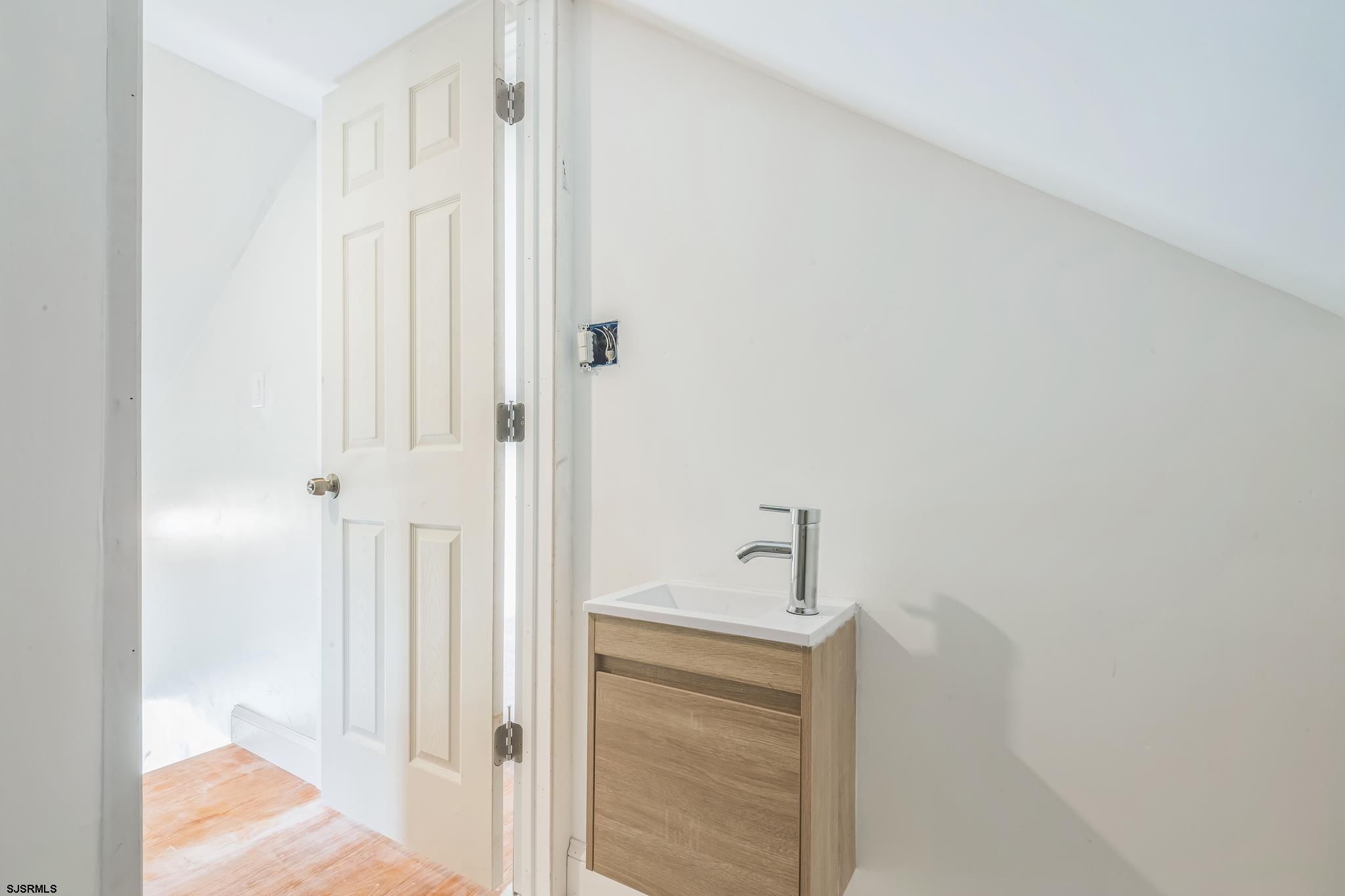 29 East Pierson Avenue Somers Point, NJ 08244 - Photo 13 of 15 a bathroom with a bathtub and shower