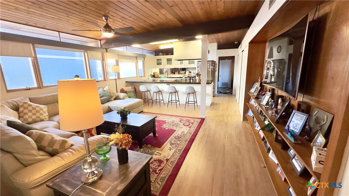 601 Lawrence Street Refugio, TX 78377 - Photo 12 of 42 a living room with furniture and a flat screen tv