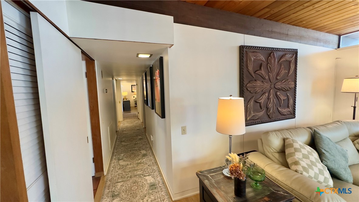 601 Lawrence Street Refugio, TX 78377 - Photo 13 of 42 a living room with furniture and a wooden floor