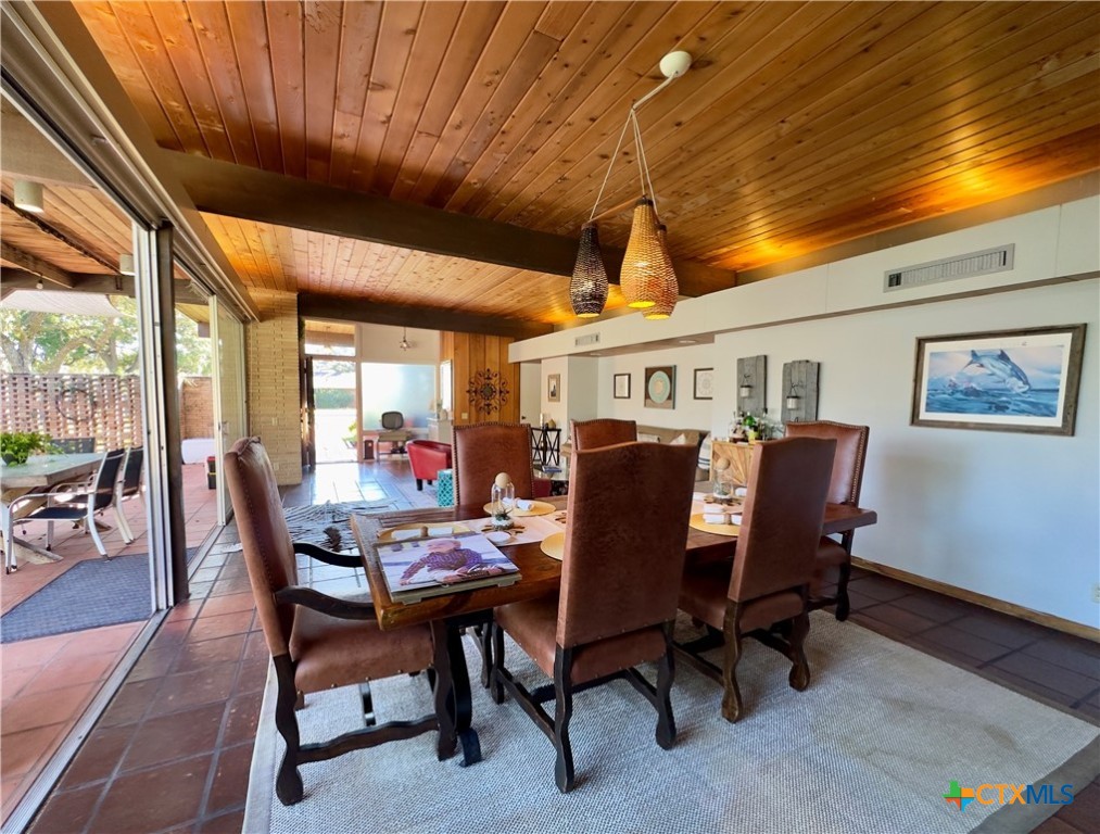 601 Lawrence Street Refugio, TX 78377 - Photo 3 of 42 a view of a dining room with furniture window and outside view