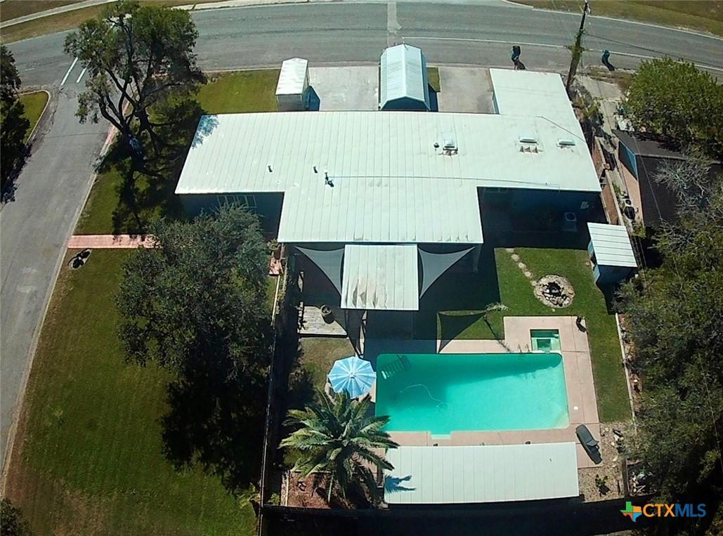 601 Lawrence Street Refugio, TX 78377 - Photo 39 of 42 an aerial view of a house with yard swimming pool and outdoor seating