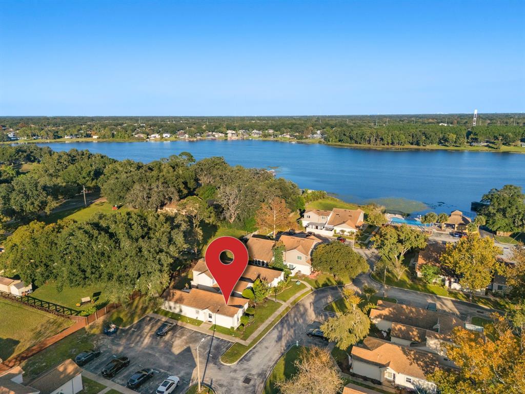an aerial view of a house with a swimming pool