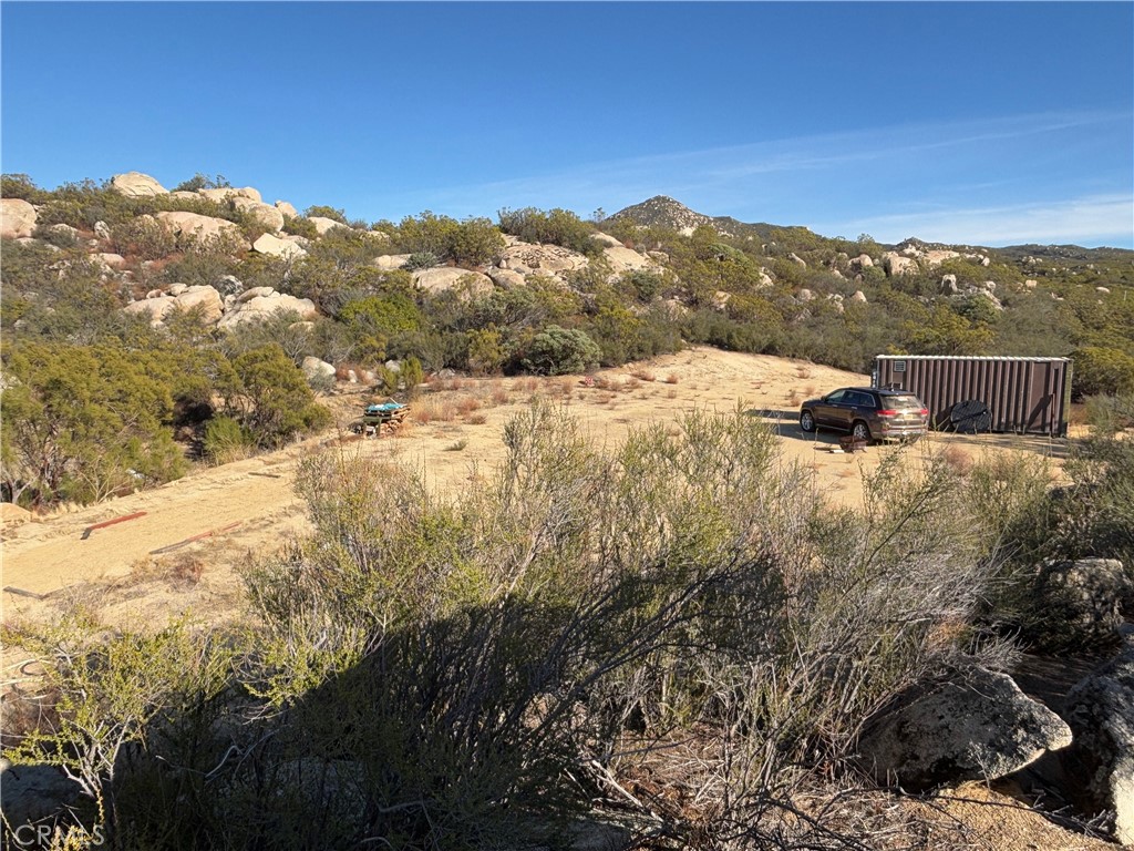 777 Ridgecrest Trail Aguanga, CA 92536 - Photo 17 of 28 a view of a mountain with a yard
