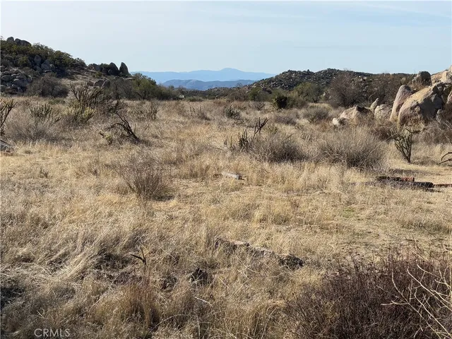 a view of a dry top of mountains and valleys