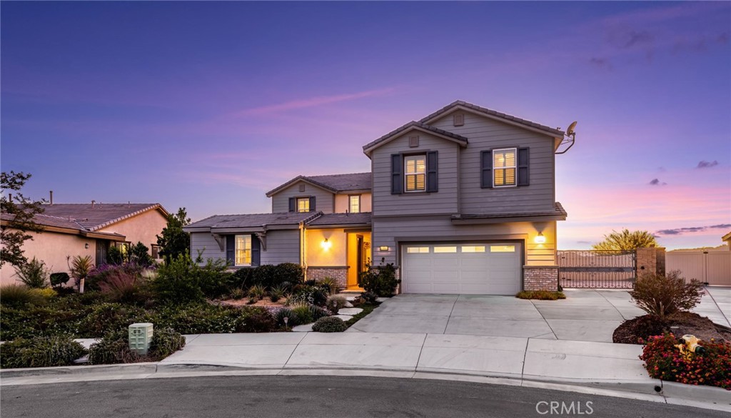 13681 Constance Avenue Riverside, CA 92503 - Photo 1 of 1 a front view of a house with a yard and garage