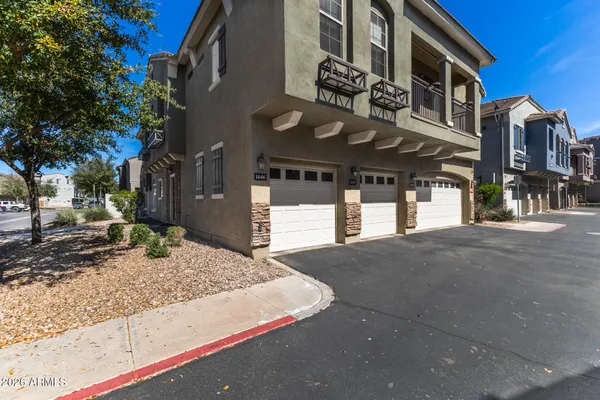 a view of a building with a street