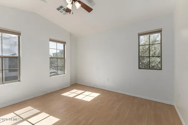 a view of empty room with windows
