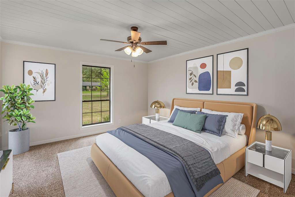 149 Southeast 6th Avenue Sibley, LA 71073 - Photo 19 of 38 a bedroom with a large bed and a window