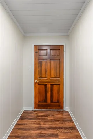 a view of wooden floor in an empty room