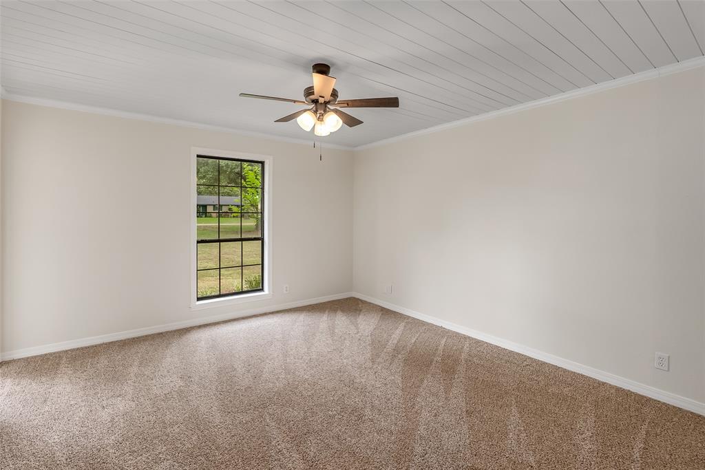 149 Southeast 6th Avenue Sibley, LA 71073 - Photo 26 of 38 an empty room with windows and fan