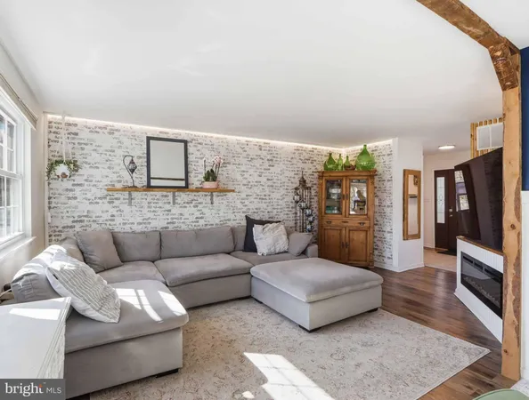 a living room with furniture and a couch