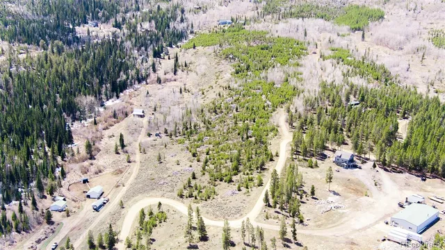 a view of a backyard of the house