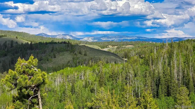 a view of lake with green space