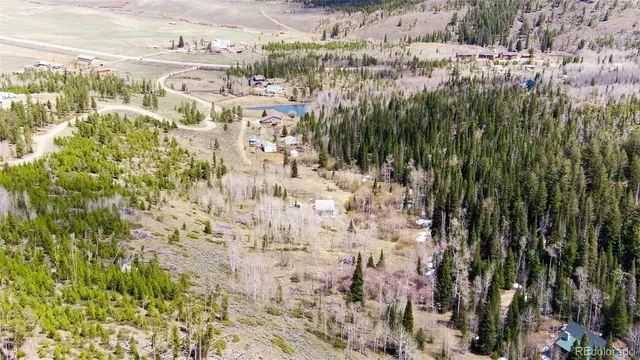 a view of outdoor space and covered with trees