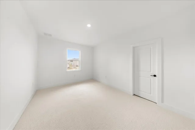 a view of a room with an empty space