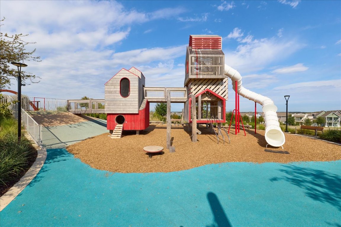 8700 Olmsted Way Austin, TX 78744 - Photo 37 of 40 View of community jungle gym